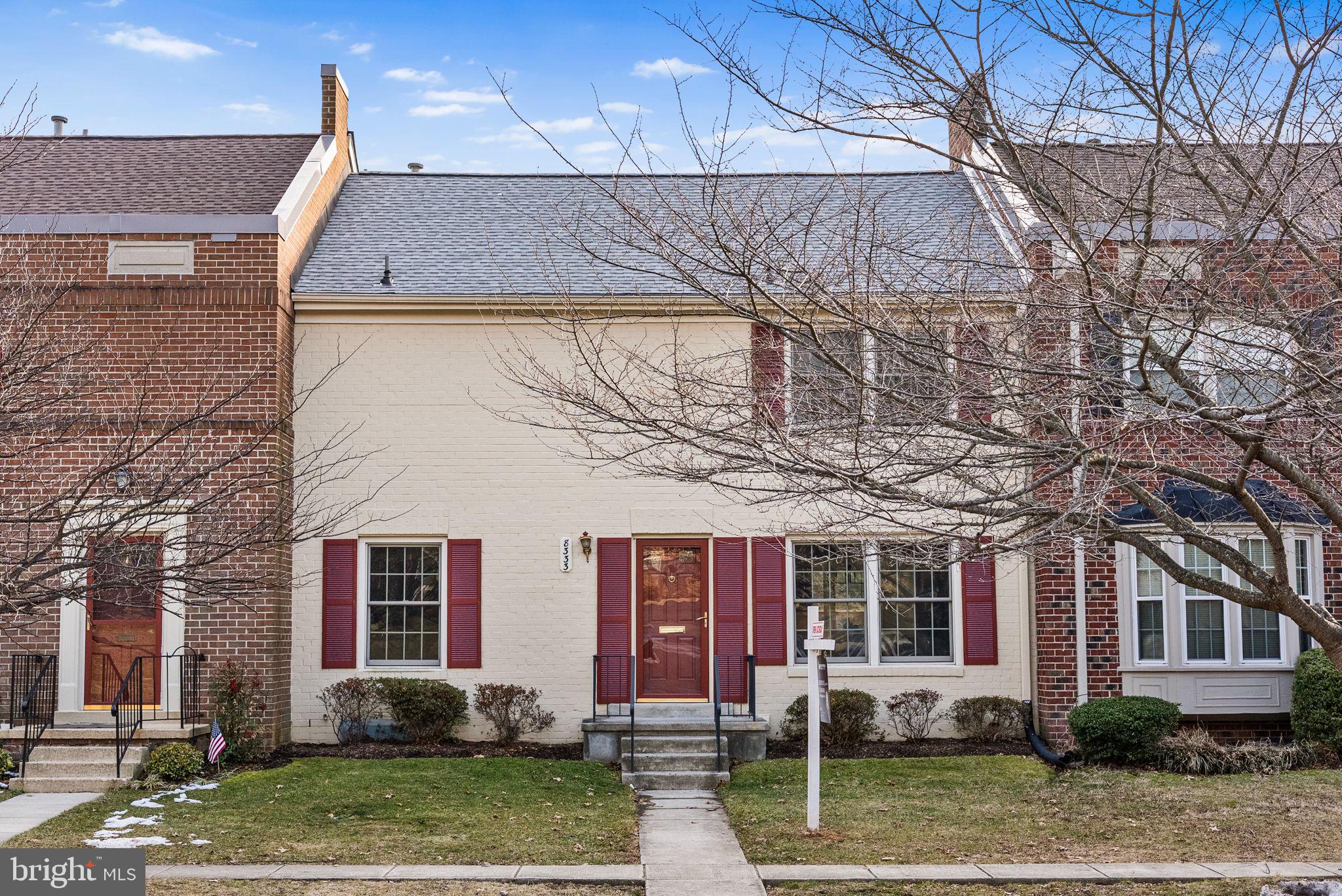 8333 Garfield Court Springfield, VA 22152 - Photo 2 of 60 a front view of a house with garden