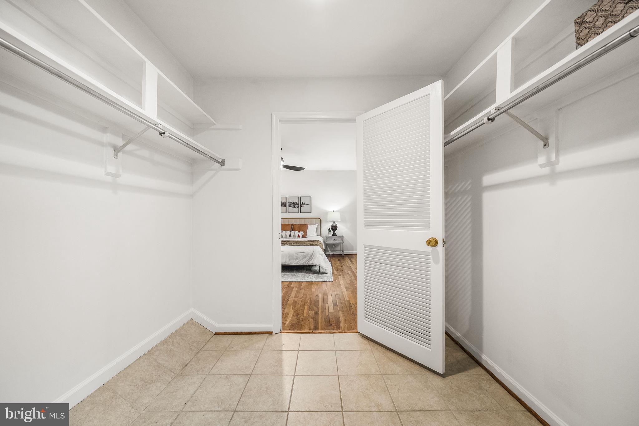8333 Garfield Court Springfield, VA 22152 - Photo 30 of 60 a view of a kitchen with refrigerator and cabinet