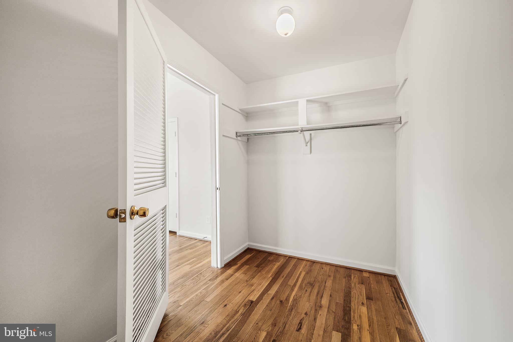 8333 Garfield Court Springfield, VA 22152 - Photo 39 of 60 a view of a room with wooden floor and white walls