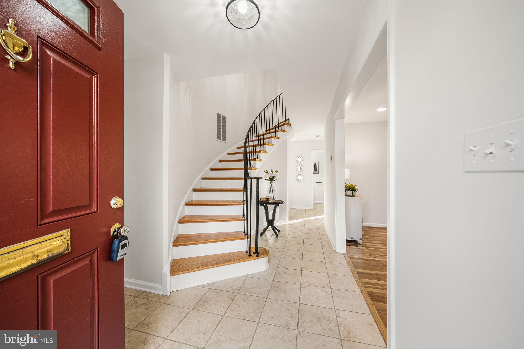 8333 Garfield Court Springfield, VA 22152 - Photo 4 of 60 a view of entryway with wooden floor