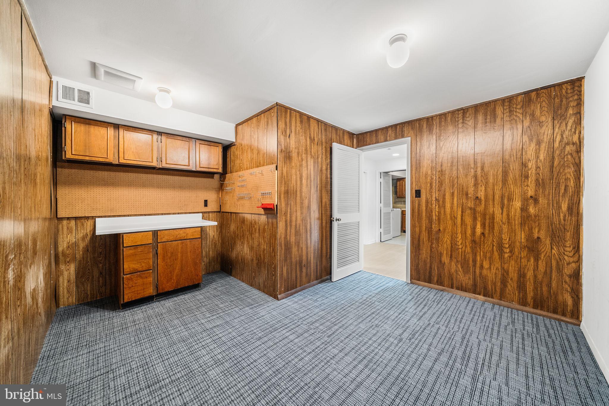 8333 Garfield Court Springfield, VA 22152 - Photo 52 of 60 a view of a room with wooden walls