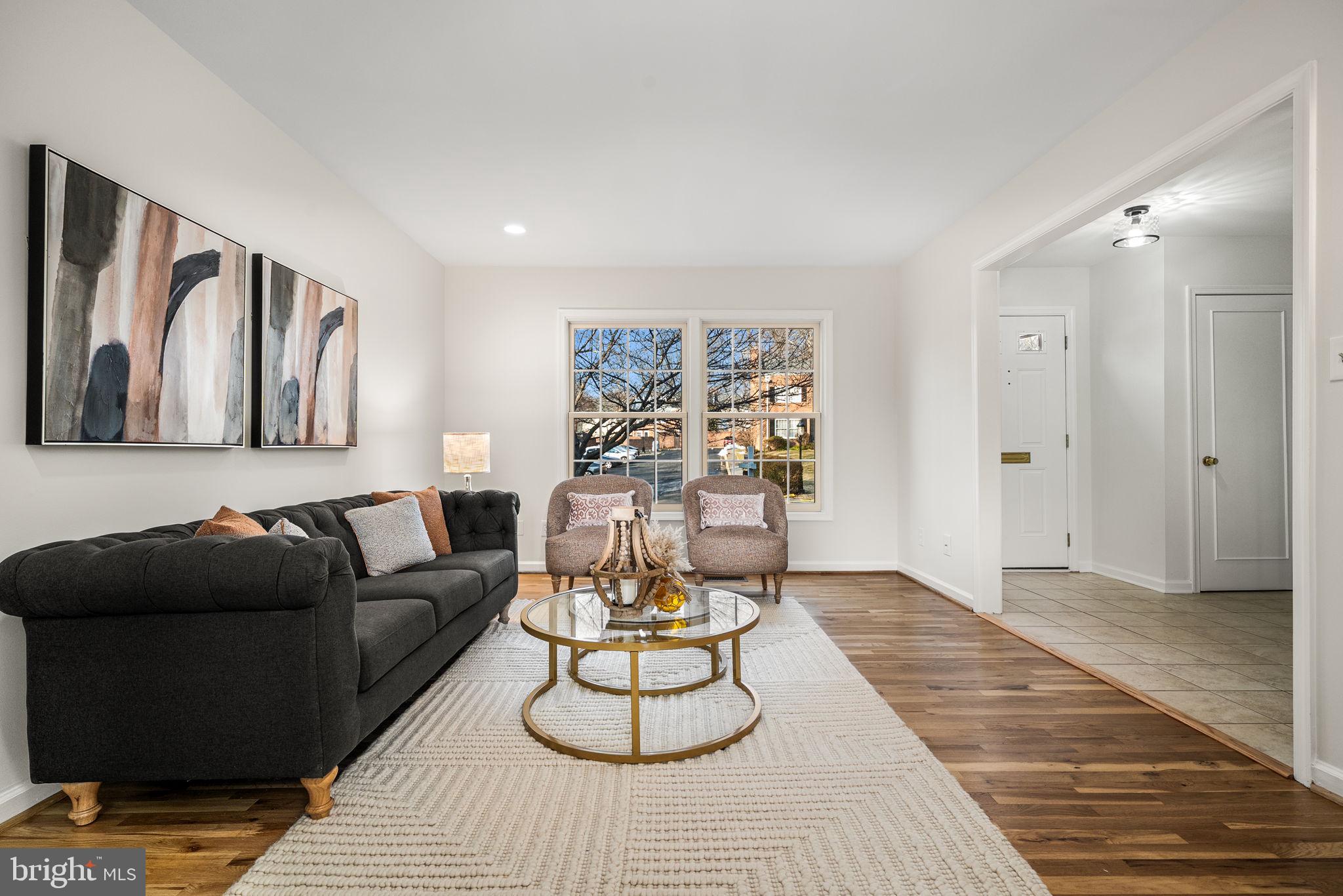 8333 Garfield Court Springfield, VA 22152 - Photo 7 of 60 a living room with furniture and white walls