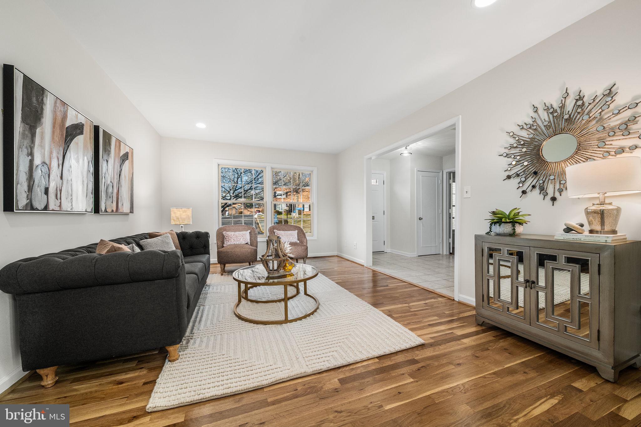 8333 Garfield Court Springfield, VA 22152 - Photo 8 of 60 a living room with furniture and wooden floor