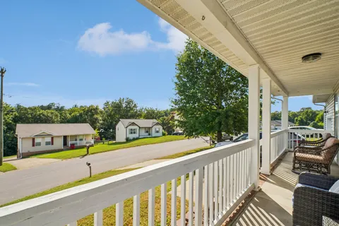 a view of a street with sitting area