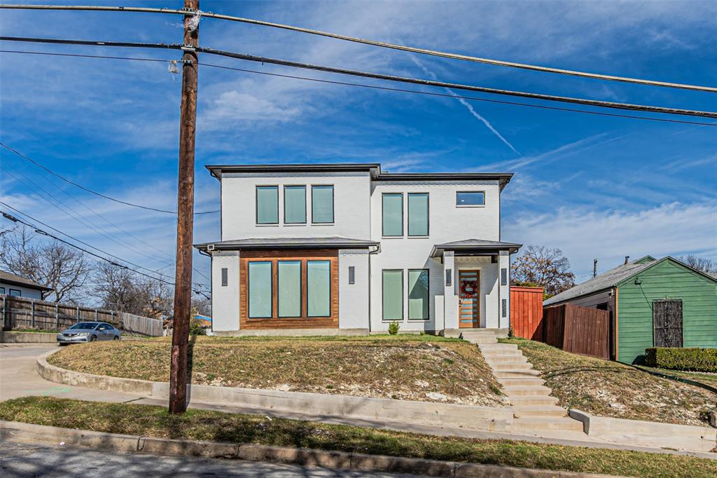 1503 Morrell Avenue Dallas, TX 75203 - Photo 2 of 30 a front view of a house with garden