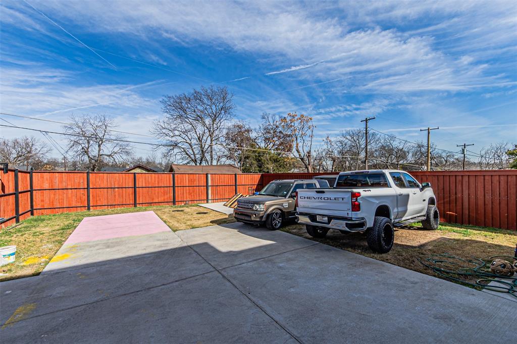 1503 Morrell Avenue Dallas, TX 75203 - Photo 28 of 30 a car parked in front of a house