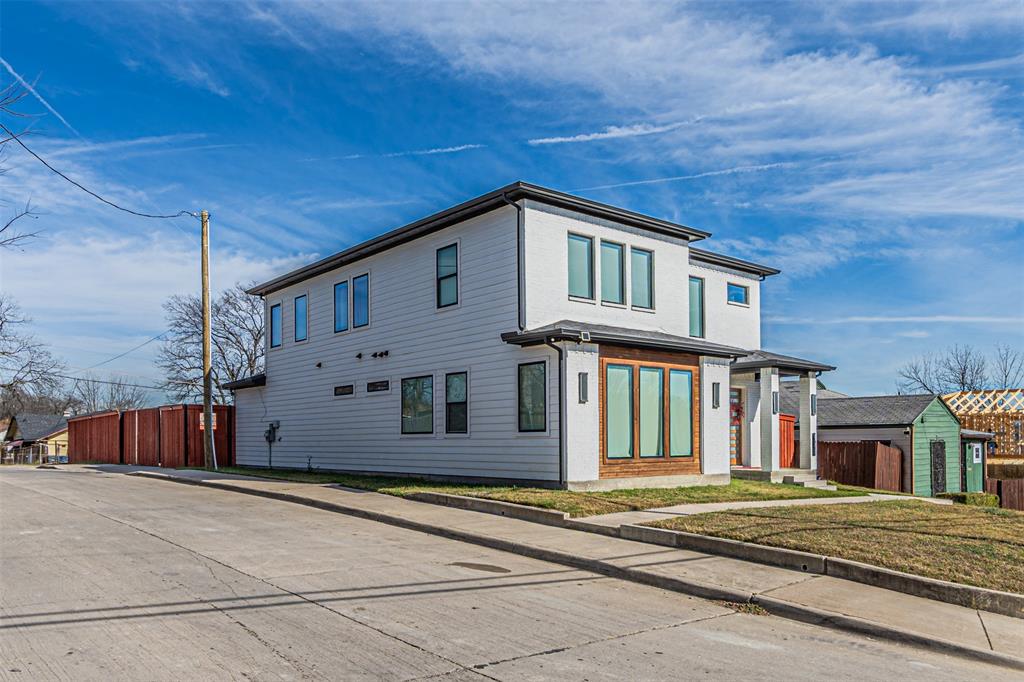1503 Morrell Avenue Dallas, TX 75203 - Photo 4 of 30 a front view of a house with a yard