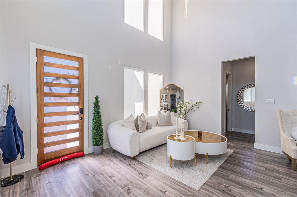 1503 Morrell Avenue Dallas, TX 75203 - Photo 6 of 30 a living room with furniture and wooden floor