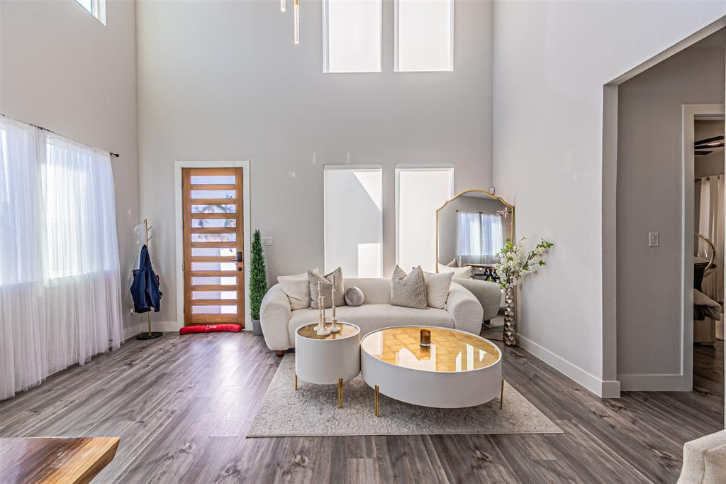 1503 Morrell Avenue Dallas, TX 75203 - Photo 8 of 30 a view of living room and wooden floor
