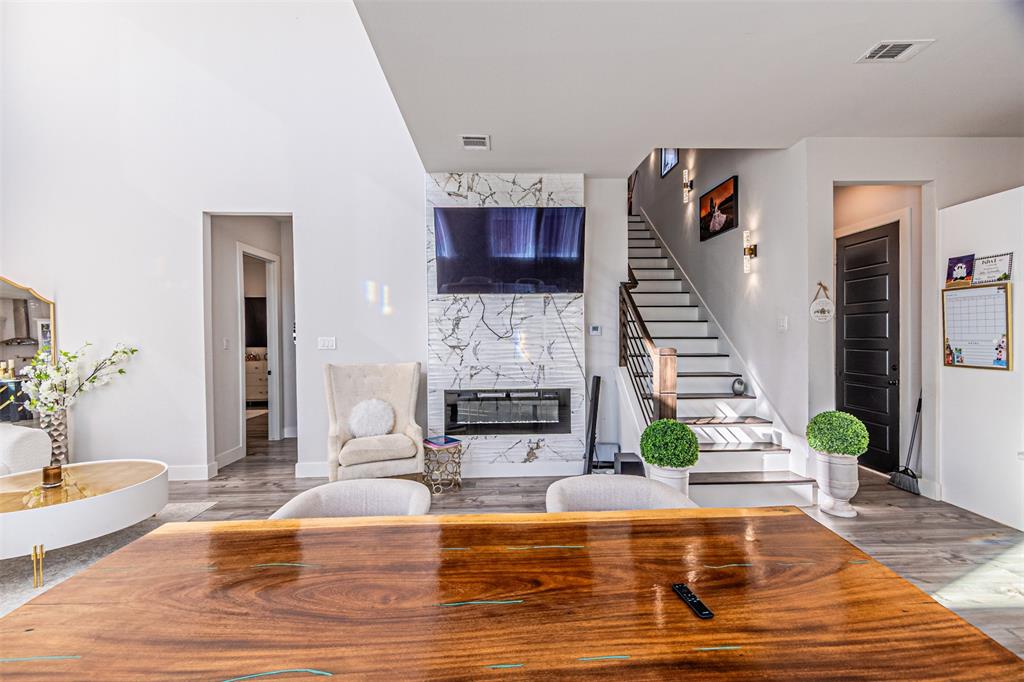 1503 Morrell Avenue Dallas, TX 75203 - Photo 9 of 30 a living room with furniture and a fireplace