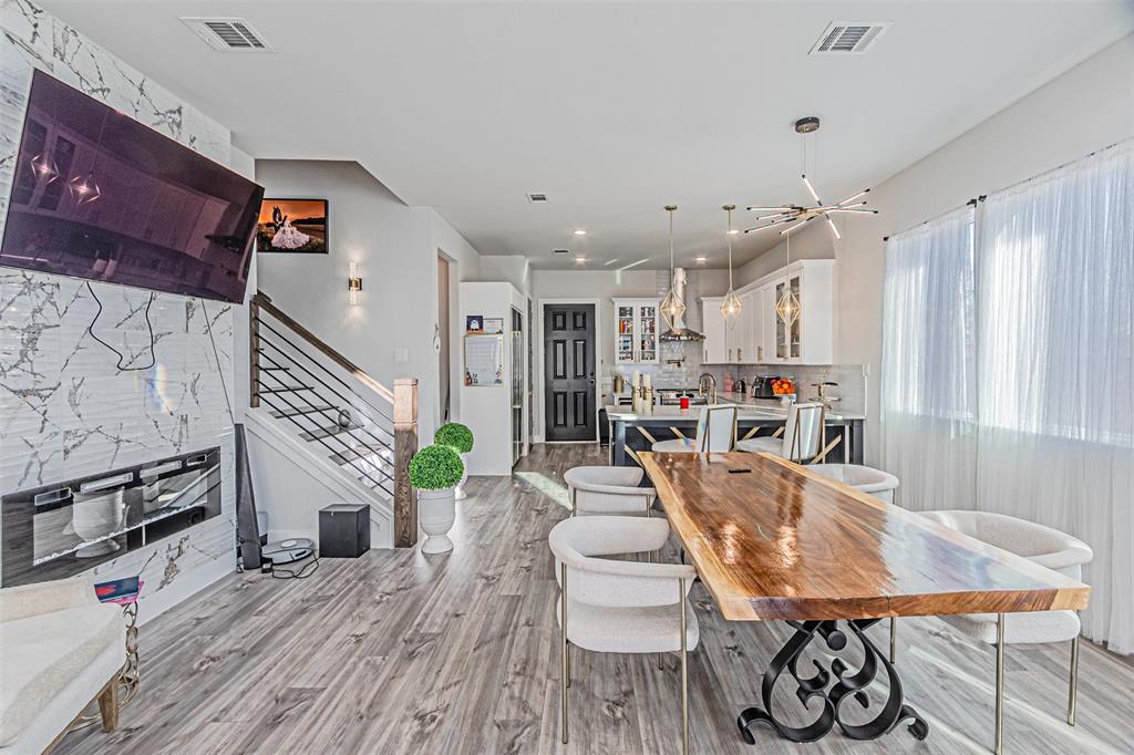 1503 Morrell Avenue Dallas, TX 75203 - Photo 10 of 30 a living room with furniture and wooden floor
