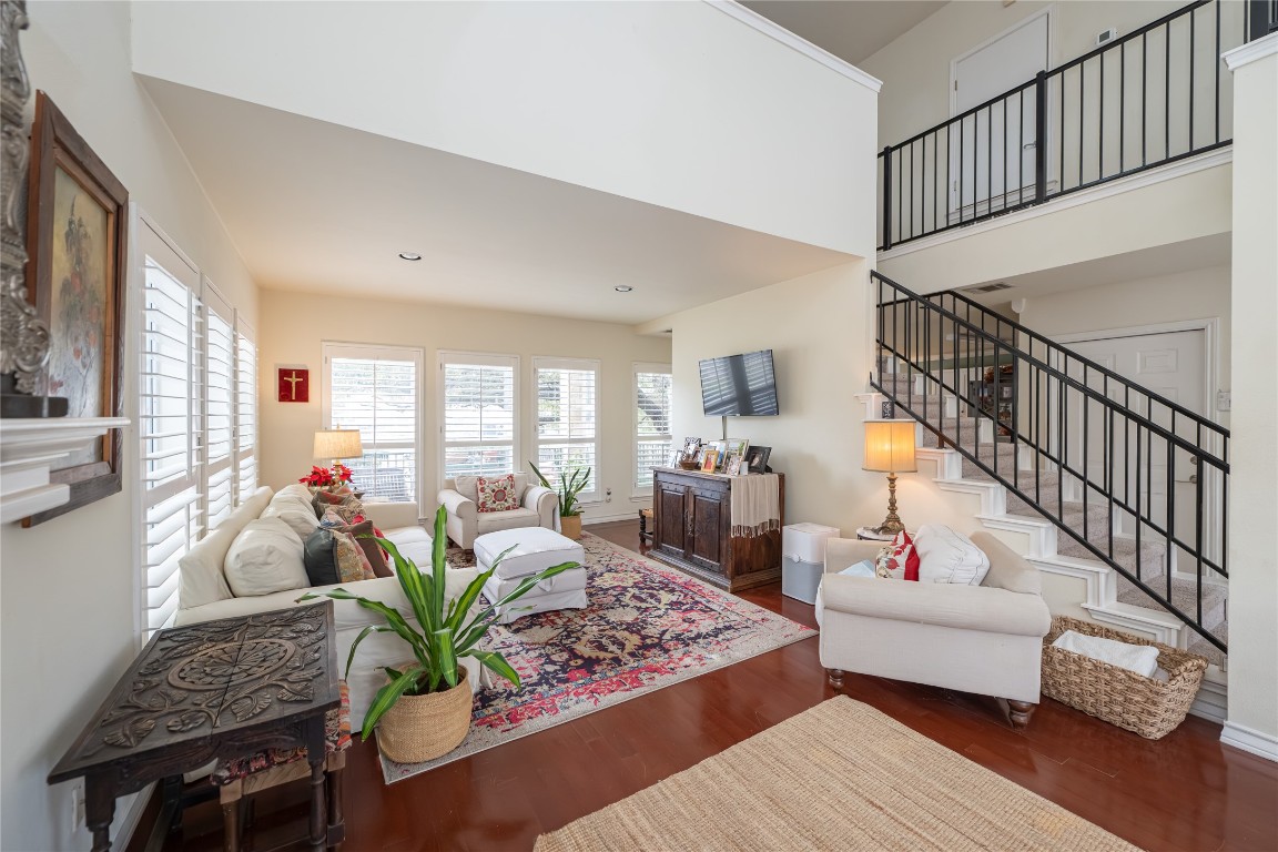 5402 Beacon Drive, Unit A Austin, TX 78734 - Photo 11 of 40 a living room with furniture fireplace and wooden floor