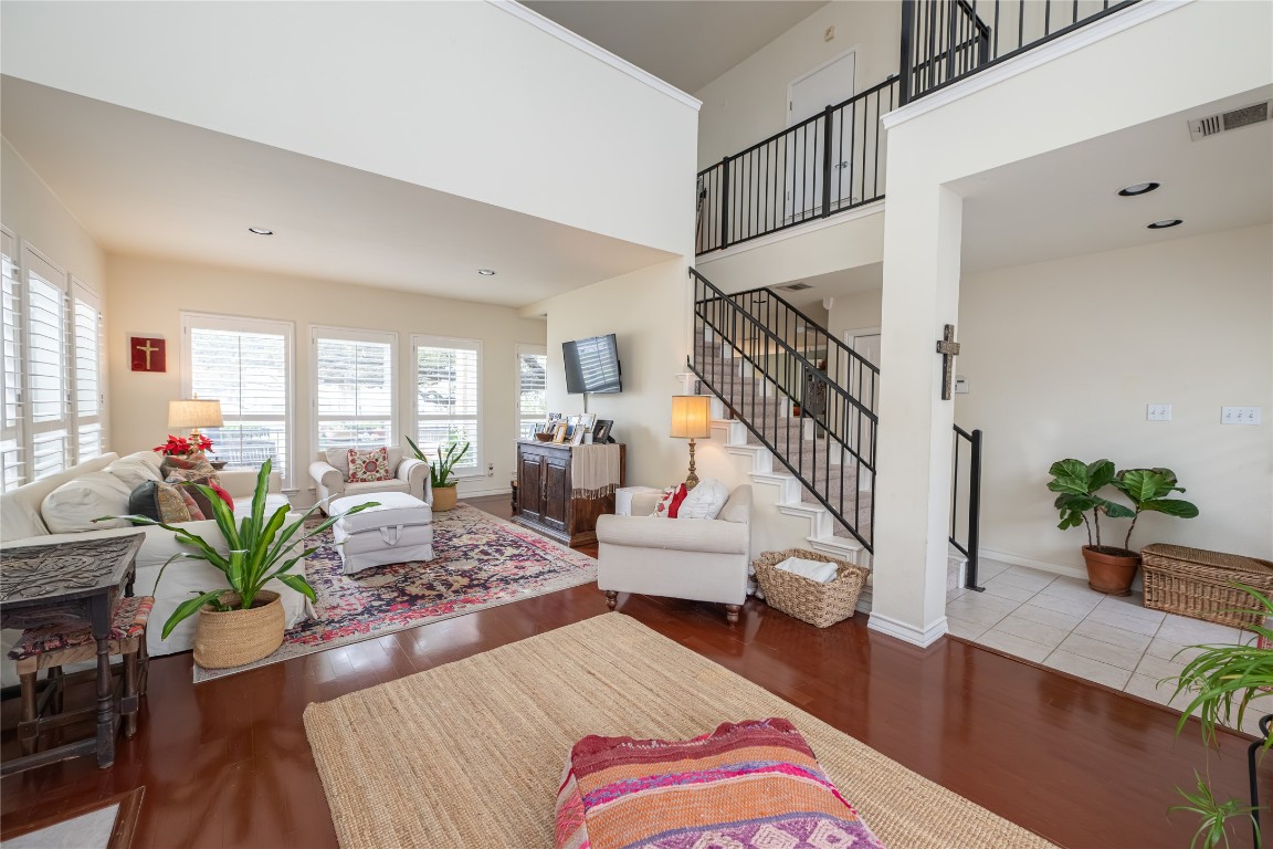5402 Beacon Drive, Unit A Austin, TX 78734 - Photo 12 of 40 a bedroom with furniture and a potted plant