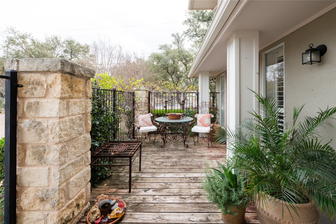 5402 Beacon Drive, Unit A Austin, TX 78734 - Photo 3 of 40 a balcony with chairs and a potted plant
