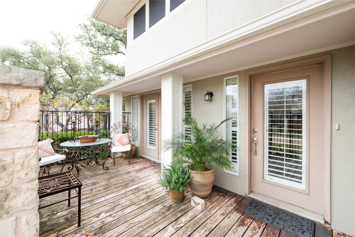5402 Beacon Drive, Unit A Austin, TX 78734 - Photo 5 of 40 a view of a patio with couches chairs and potted plants