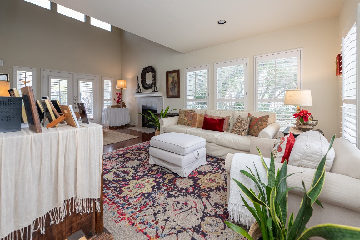 5402 Beacon Drive, Unit A Austin, TX 78734 - Photo 7 of 40 a living room filled with furniture windows and a potted plant