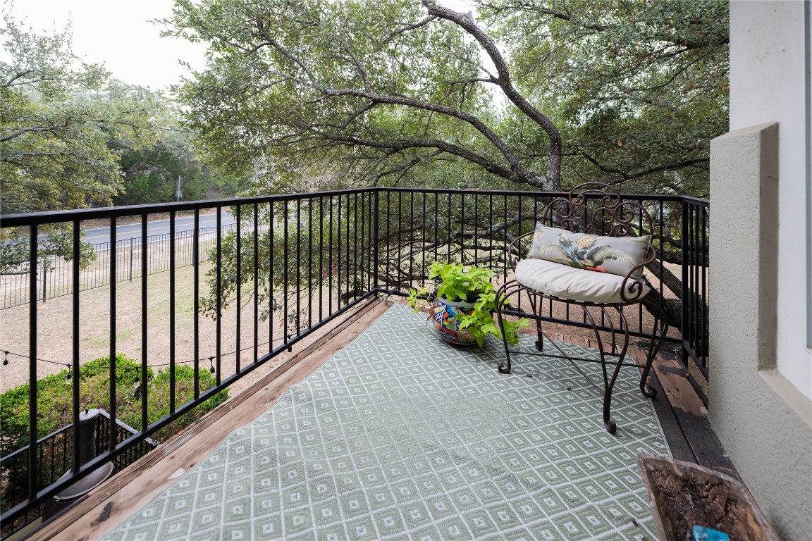 5402 Beacon Drive, Unit A Austin, TX 78734 - Photo 10 of 40 a view of a chairs and table on the deck