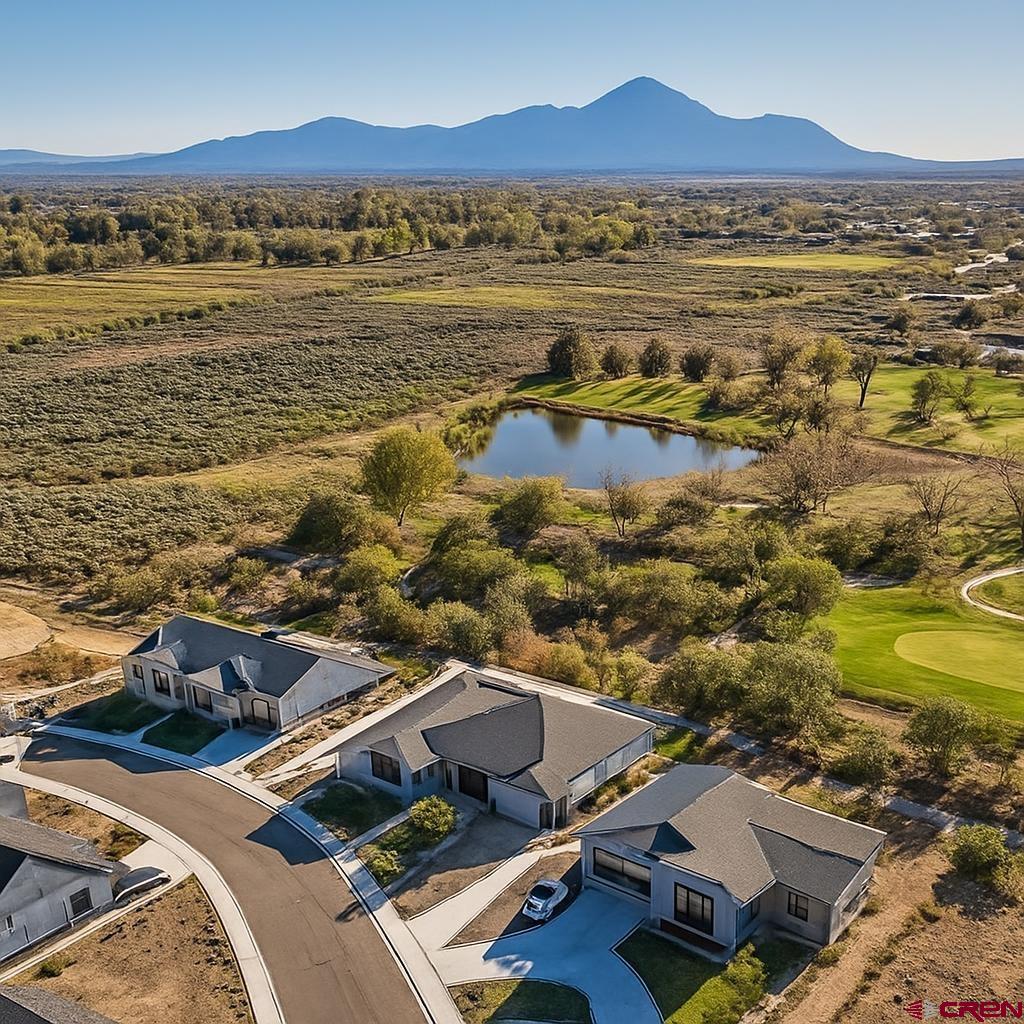 1711 Golf Course Lane Cortez, CO 81321 - Photo 42 of 45 an aerial view of residential houses with outdoor space