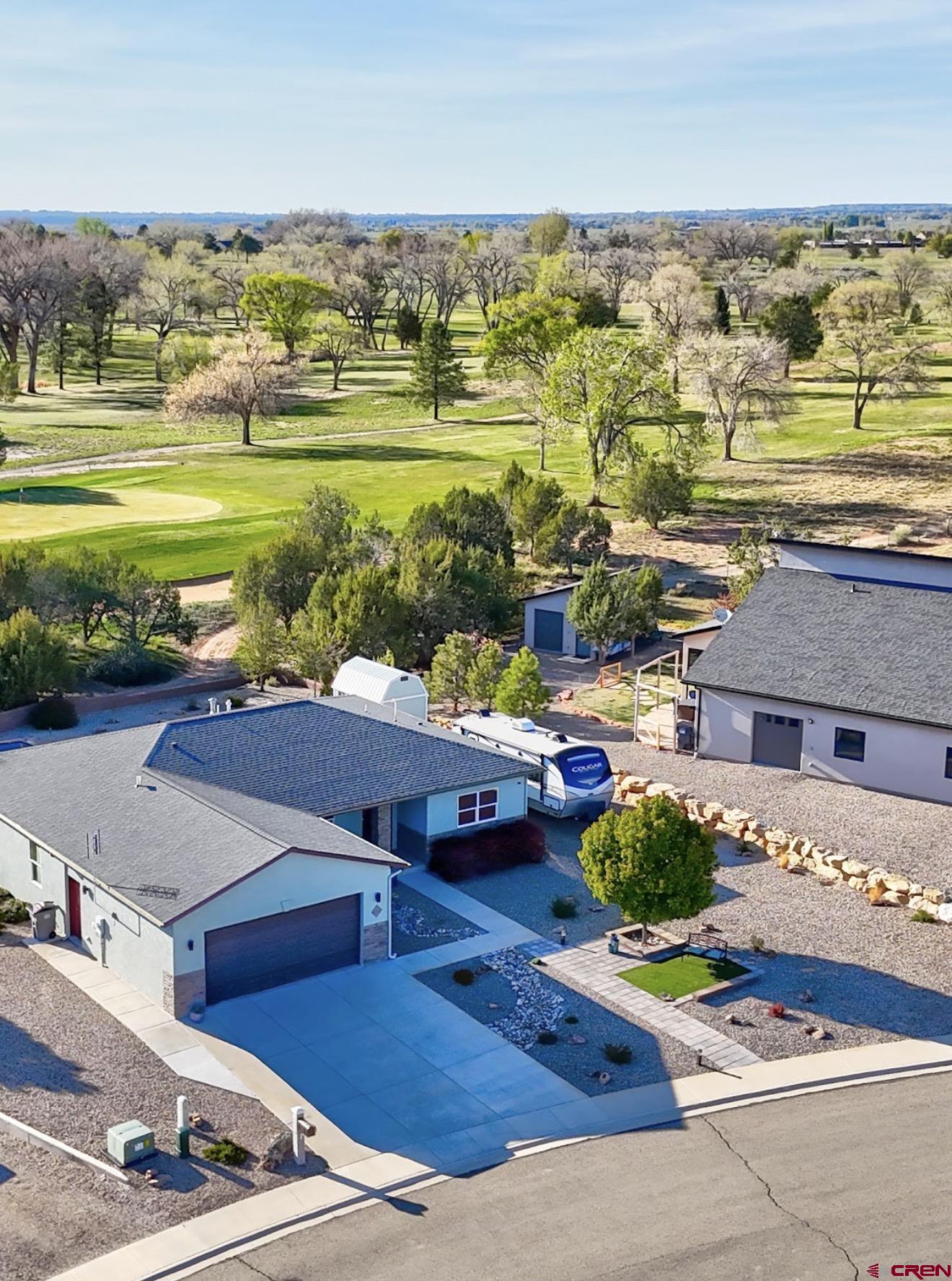 1711 Golf Course Lane Cortez, CO 81321 - Photo 43 of 45 an aerial view of a house with a ocean view