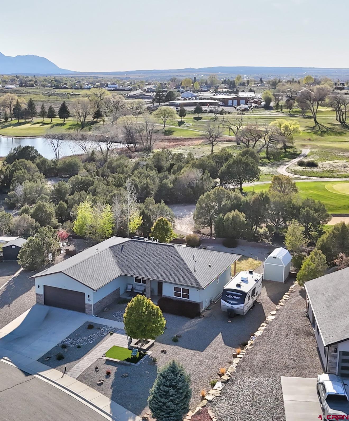 1711 Golf Course Lane Cortez, CO 81321 - Photo 44 of 45 an aerial view of a house with yard swimming pool and outdoor seating