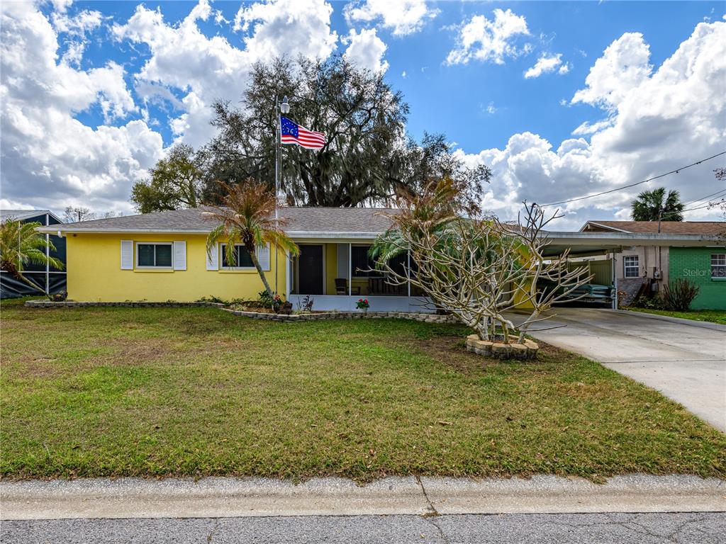 907 Hillside Terrace Brandon, FL 33511 - Photo 1 of 35 a front view of a house with garden