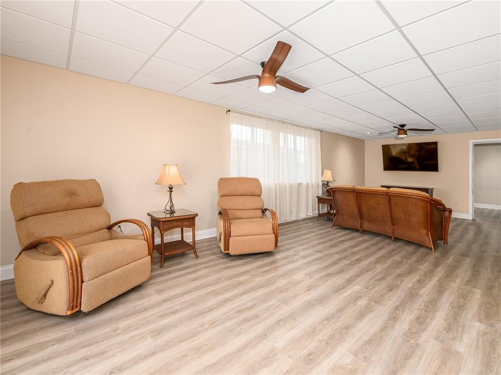907 Hillside Terrace Brandon, FL 33511 - Photo 13 of 35 a living room with furniture and a flat screen tv