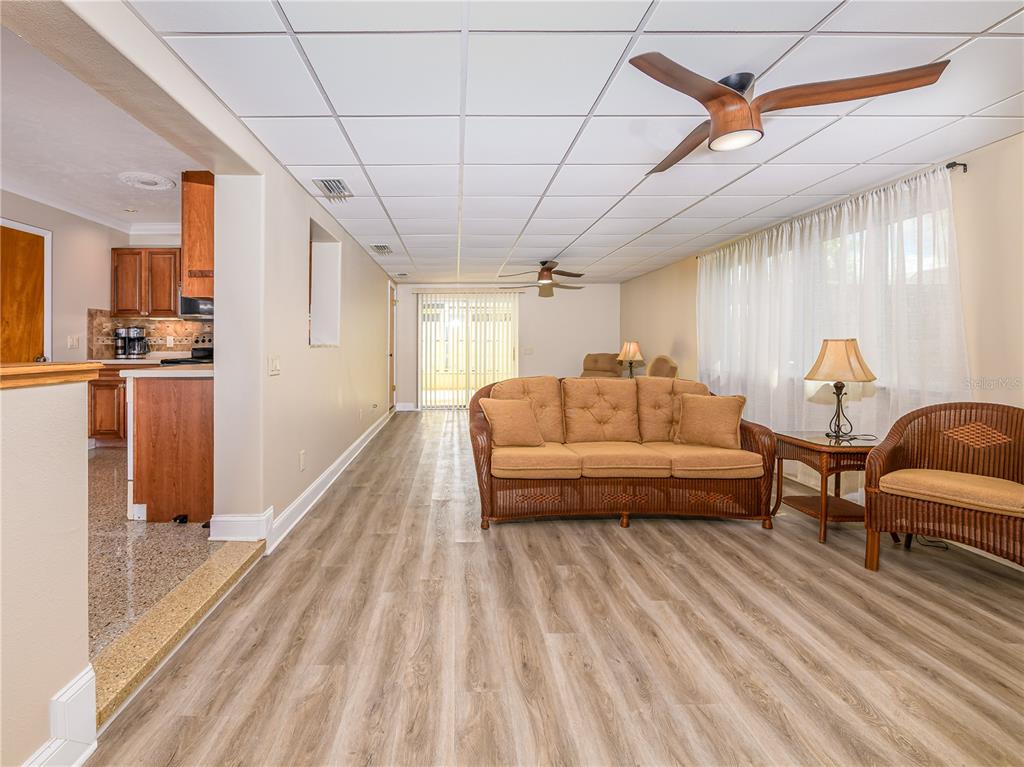 907 Hillside Terrace Brandon, FL 33511 - Photo 15 of 35 a living room with furniture and a wooden floor