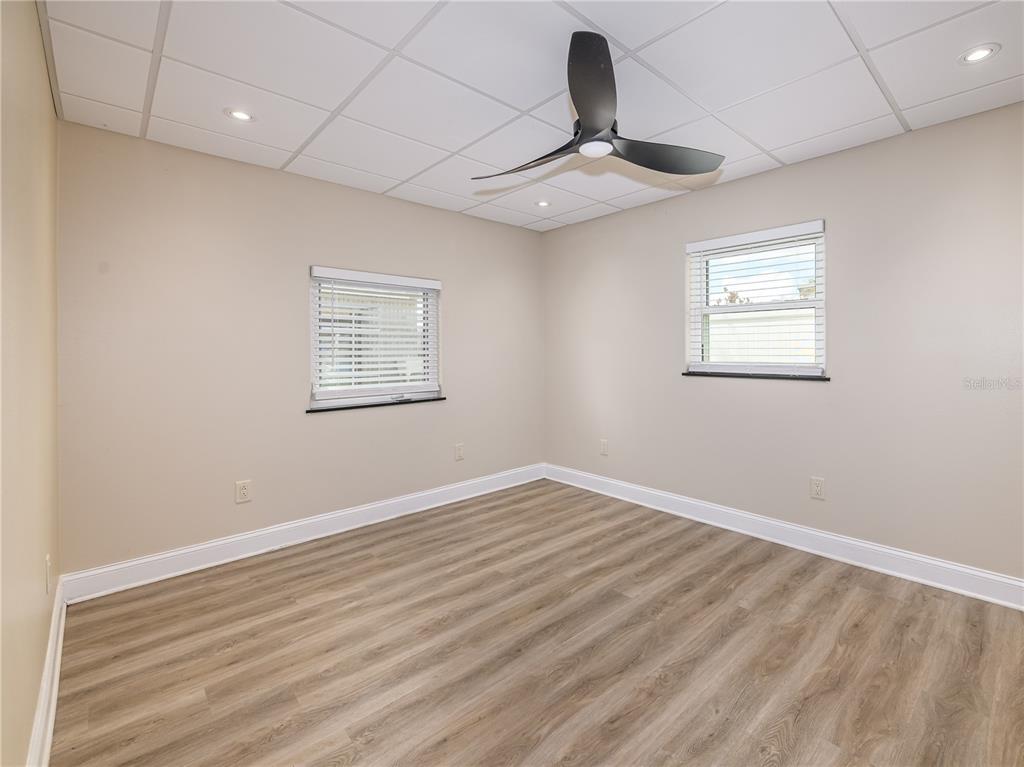 907 Hillside Terrace Brandon, FL 33511 - Photo 19 of 35 a view of empty room with ceiling fan