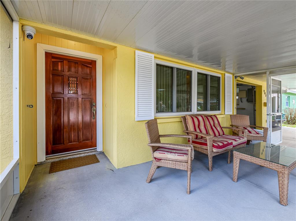 907 Hillside Terrace Brandon, FL 33511 - Photo 2 of 35 a outdoor living space with furniture and a window
