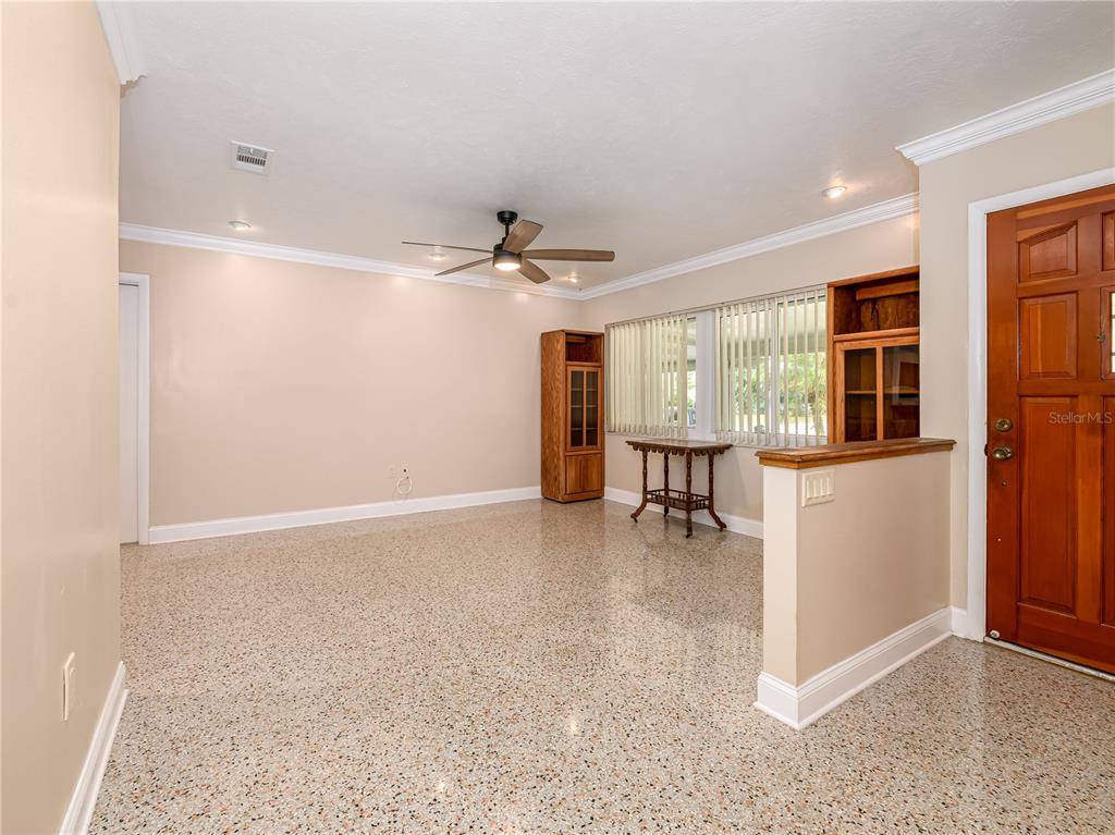 907 Hillside Terrace Brandon, FL 33511 - Photo 4 of 35 a view of an empty room with a window