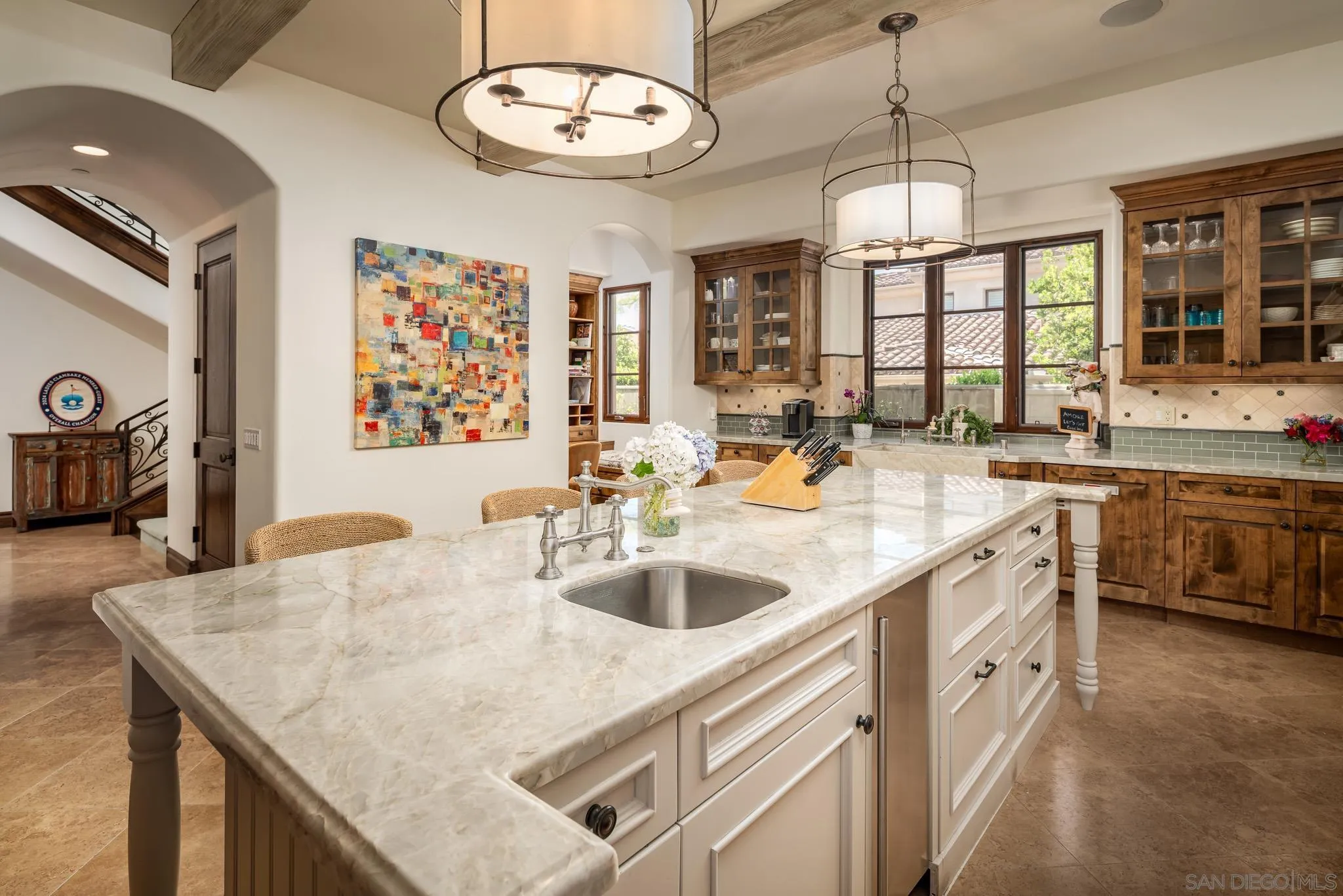 8053 High Time Ridge San Diego, CA 92127 - Photo 15 of 62 a kitchen with stainless steel appliances granite countertop a sink and a refrigerator