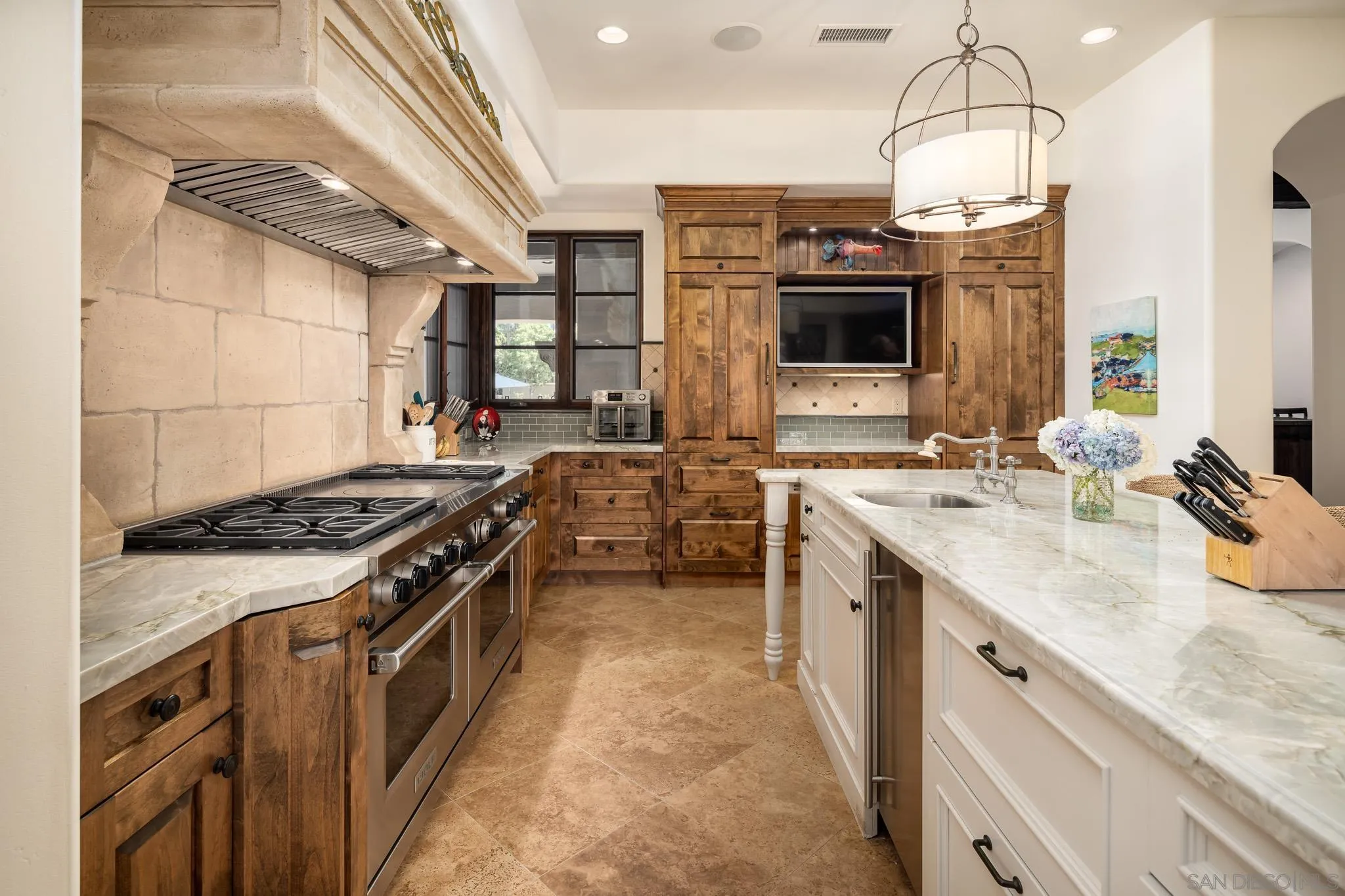 8053 High Time Ridge San Diego, CA 92127 - Photo 17 of 62 a kitchen with a stove and a sink