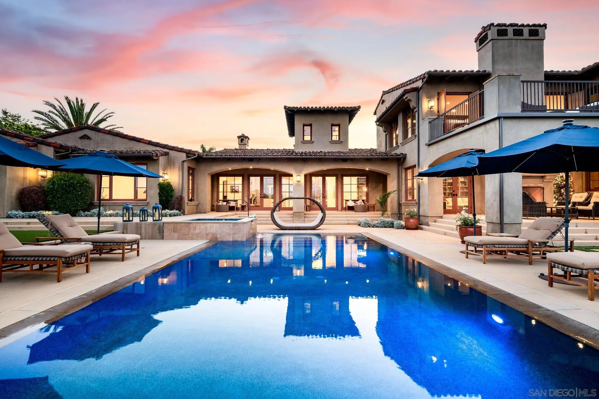 8053 High Time Ridge San Diego, CA 92127 - Photo 2 of 62 a view of a house with swimming pool and sitting area