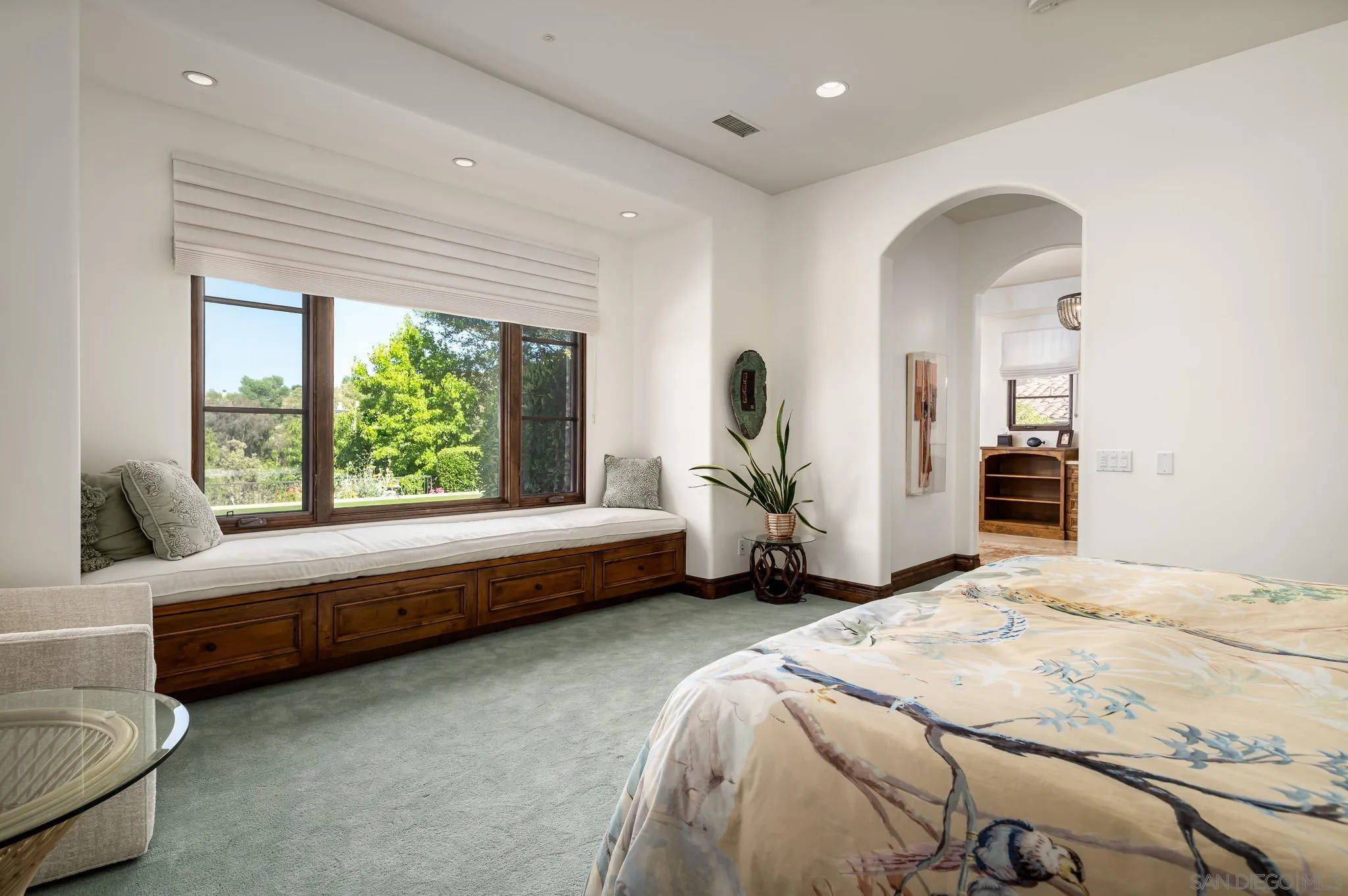 8053 High Time Ridge San Diego, CA 92127 - Photo 26 of 62 a spacious bedroom with a bed and a large window