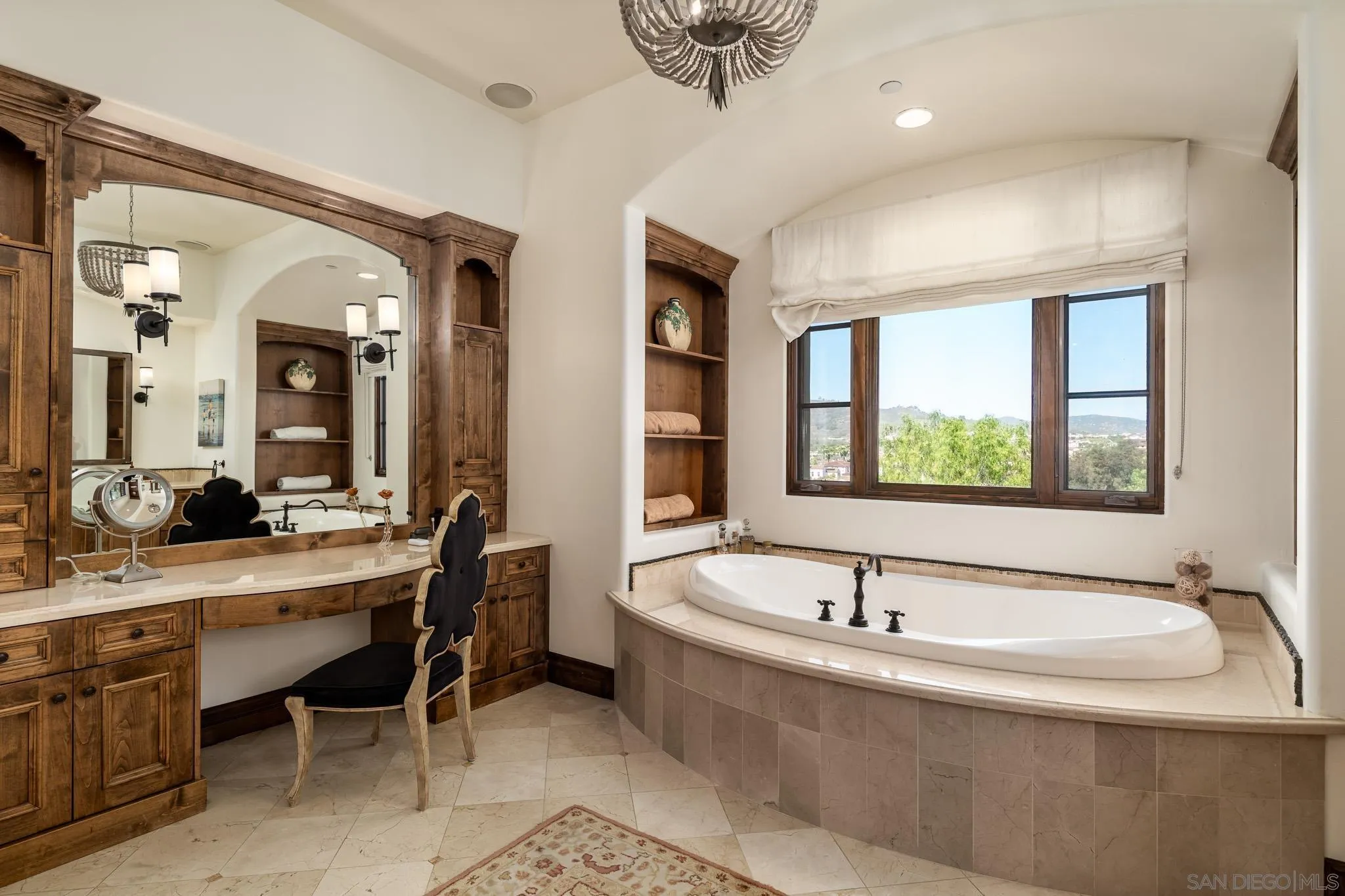 8053 High Time Ridge San Diego, CA 92127 - Photo 30 of 62 a spacious bathroom with a tub and a large mirror
