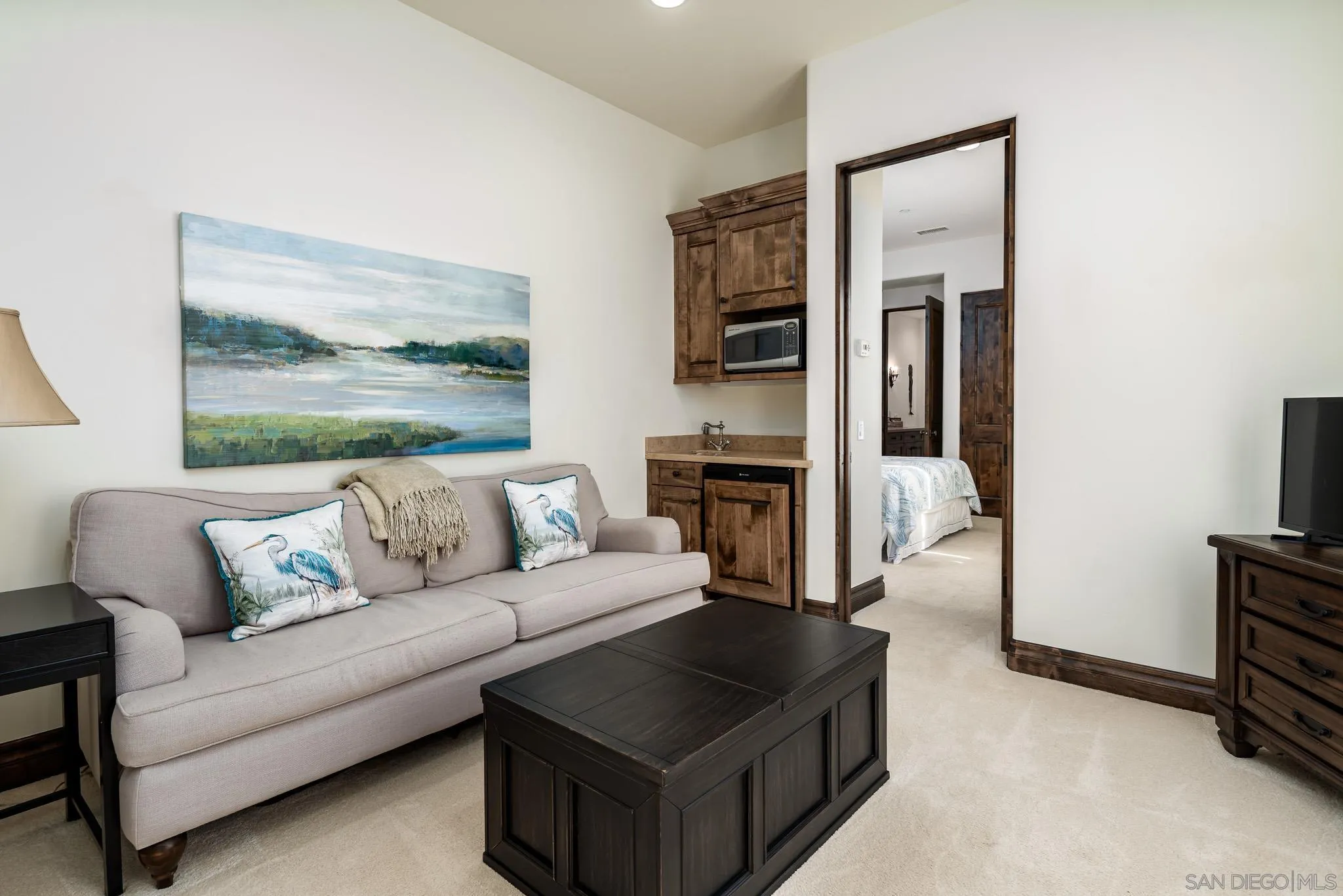8053 High Time Ridge San Diego, CA 92127 - Photo 35 of 62 a living room with furniture and a flat screen tv
