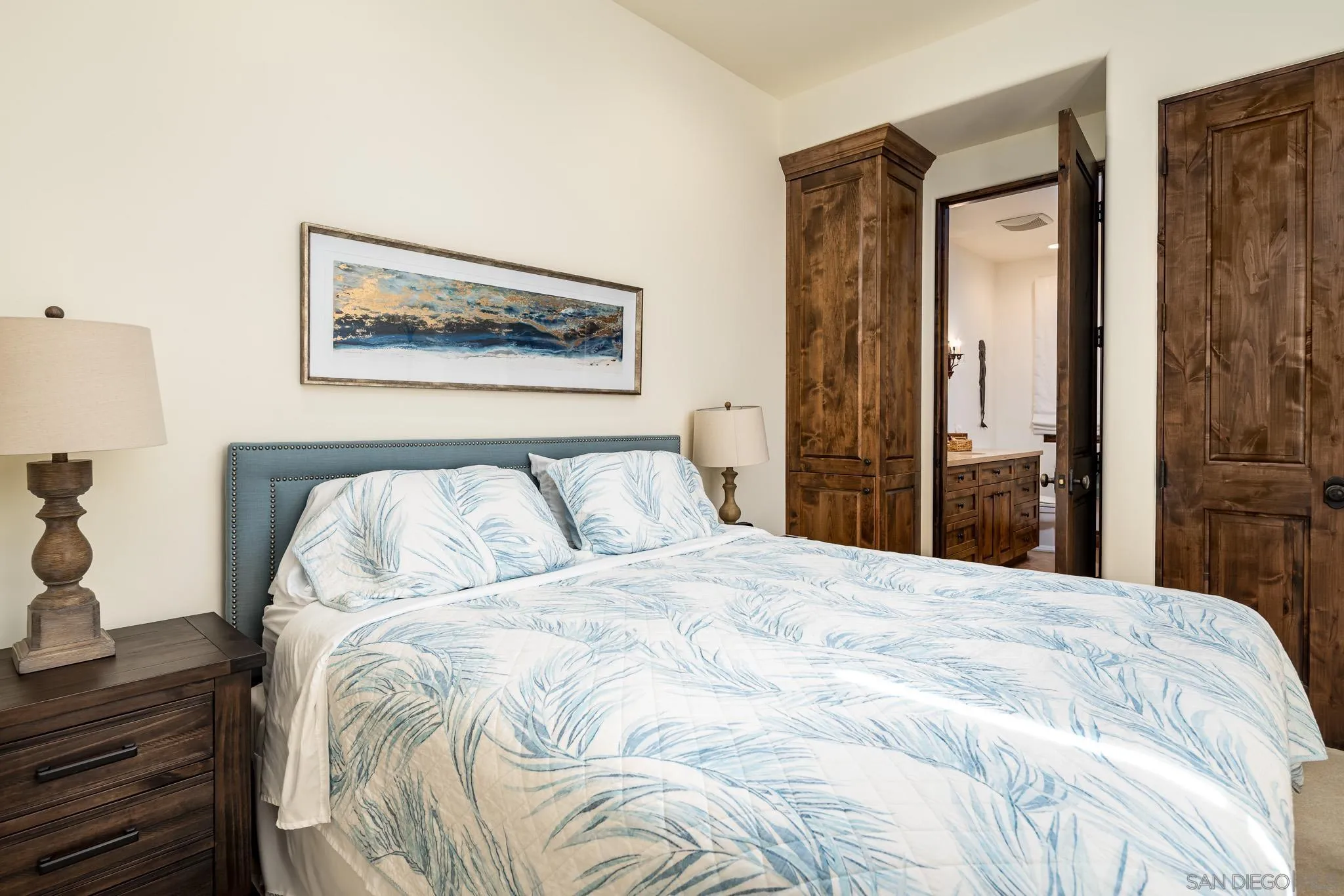 8053 High Time Ridge San Diego, CA 92127 - Photo 36 of 62 a large bed in a bedroom next to a window