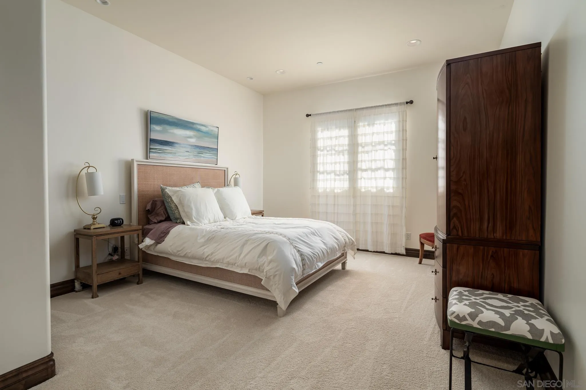 8053 High Time Ridge San Diego, CA 92127 - Photo 38 of 62 a spacious bedroom with a bed and a window