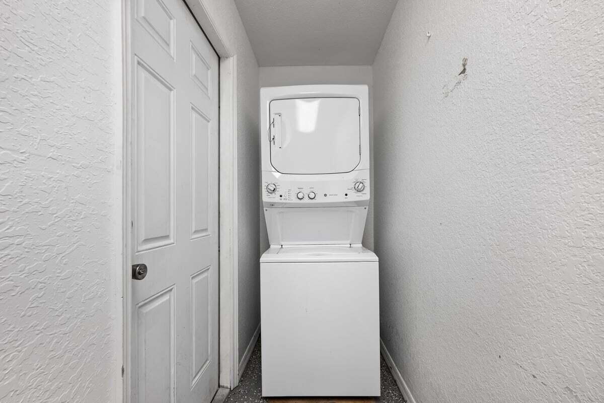 1875 45th Avenue Vero Beach, FL 32966 - Photo 12 of 14 a utility room with dryer and washer