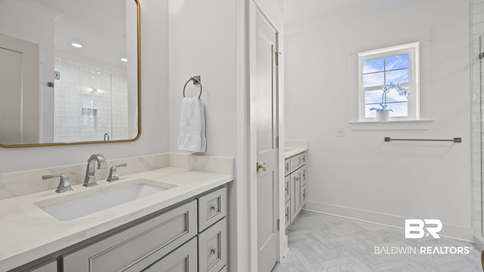 30449 River Road Orange Beach, AL 36561 - Photo 12 of 39 Full bathroom with a shower stall and two vanities