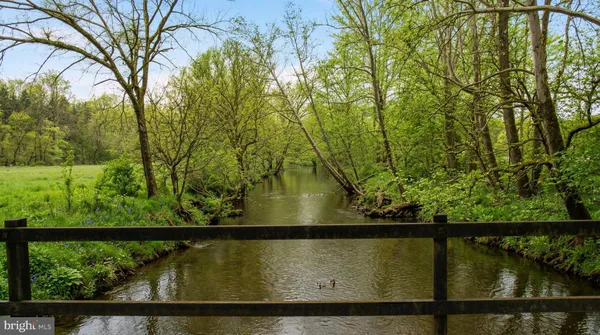 a view of swimming pool from a balcony
