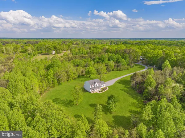 a view of a lake with a yard