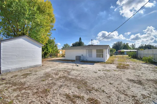 a house with trees in front of it