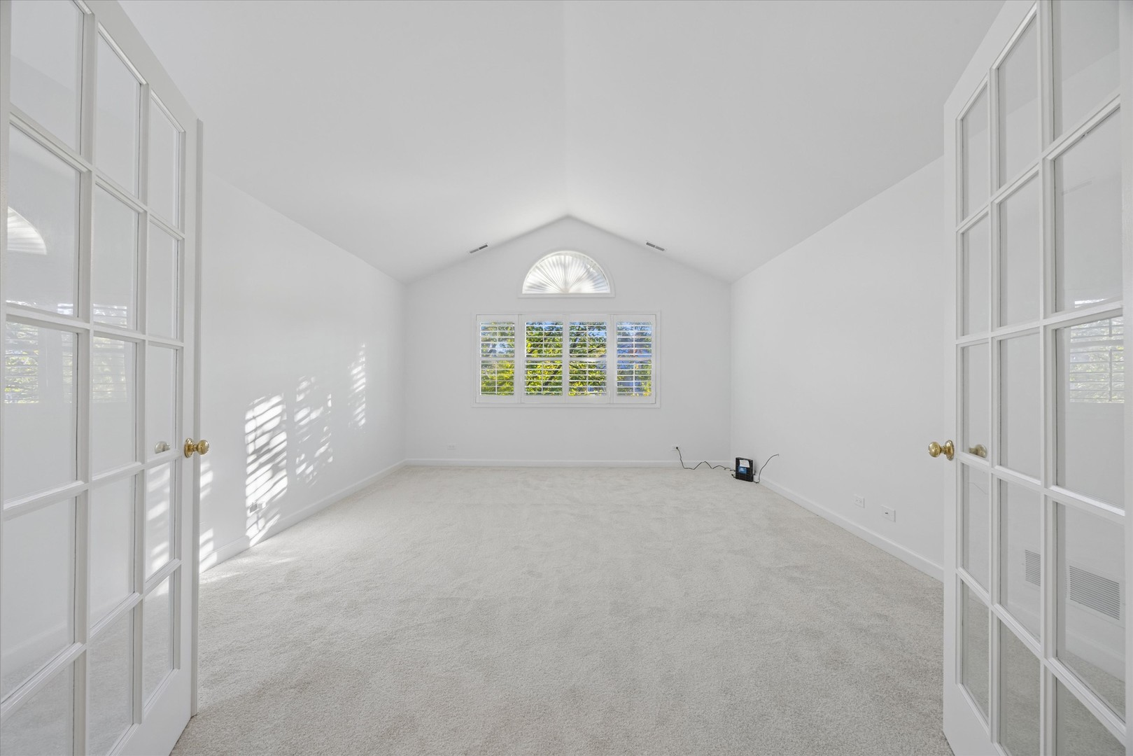 179 Foxborough Place Burr Ridge, IL 60527 - Photo 4 of 18 a view of an empty room and a window