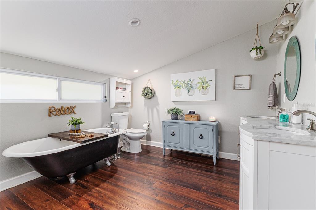 749 South Rushing Avenue Lakeland, FL 33801 - Photo 18 of 45 a living room with furniture and a table
