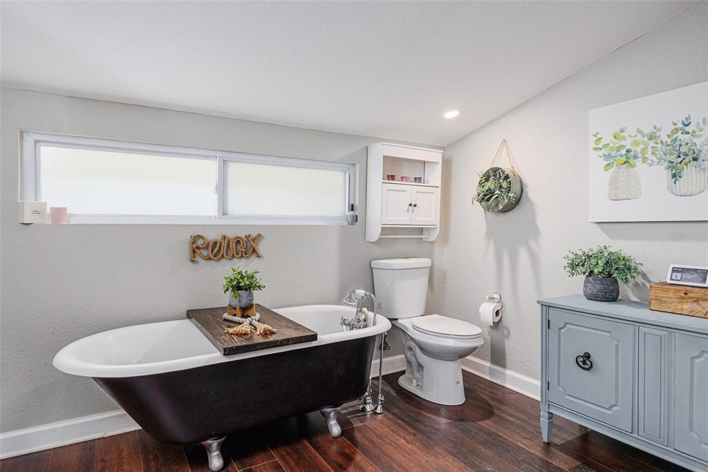 749 South Rushing Avenue Lakeland, FL 33801 - Photo 19 of 45 a view of a workspace room with furniture and wooden floor
