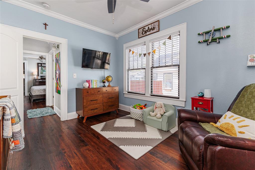 749 South Rushing Avenue Lakeland, FL 33801 - Photo 25 of 45 a living room with furniture and a flat screen tv