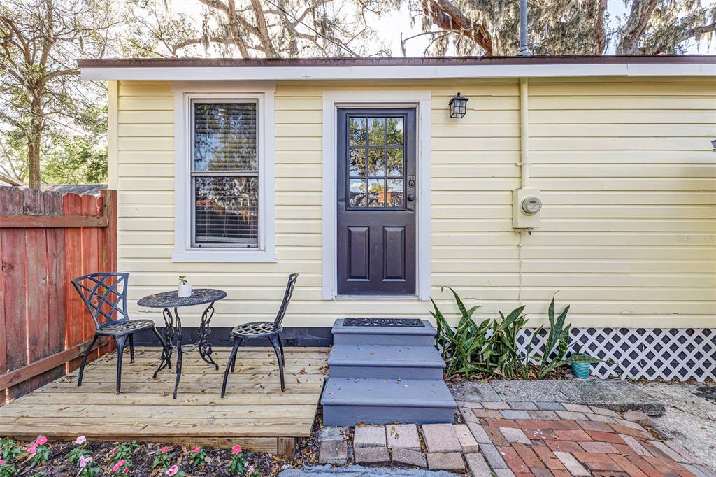 749 South Rushing Avenue Lakeland, FL 33801 - Photo 33 of 45 a view of a patio with table and chairs and potted plants