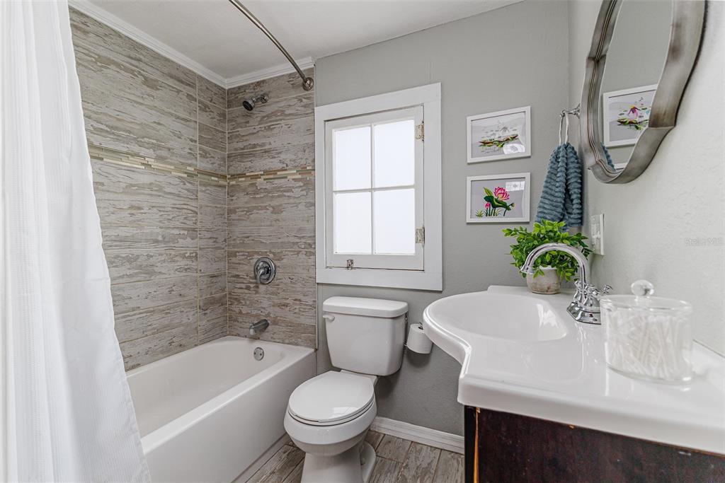 749 South Rushing Avenue Lakeland, FL 33801 - Photo 39 of 45 a bathroom with a sink toilet and shower