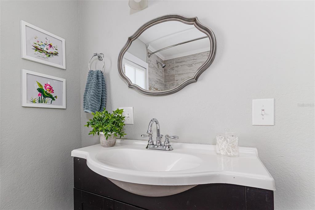 749 South Rushing Avenue Lakeland, FL 33801 - Photo 40 of 45 a bathroom with a sink and a mirror